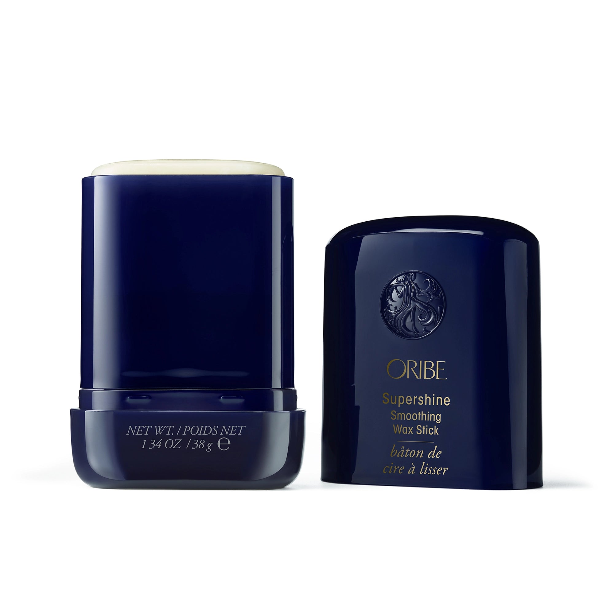 Oribe Supershine Smoothing Wax Stick avoinna, kevyt vahakoostumus hiusten silottamiseen